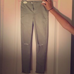 Zara never used green ripped jeans
